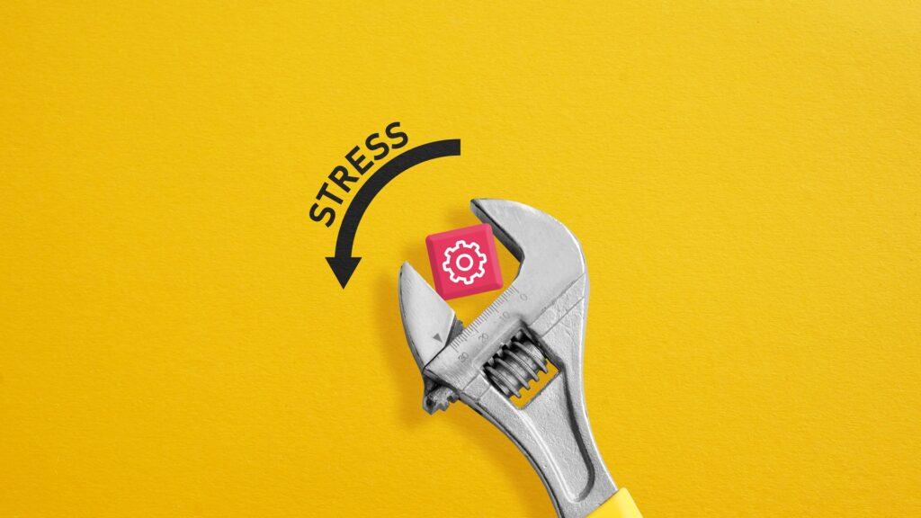 Schraubenschlüssel hält Symbol zur Stressreduktion | Wandpaneel